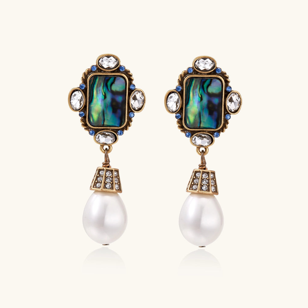 Gold-plated brass drop earrings featuring iridescent abalone shell centers, crystal accents, and white pearl drops.