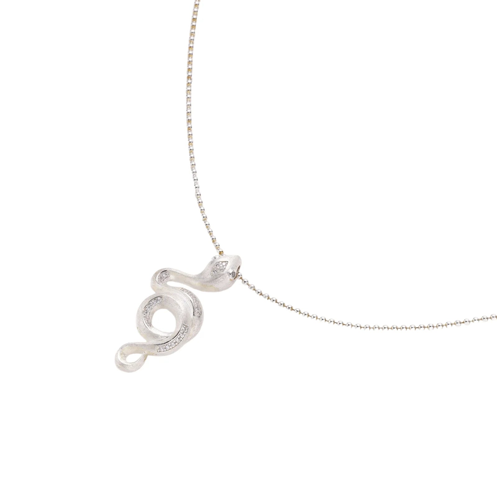 Abstract S-curve sterling silver pendant with zirconia accents on delicate chain against white background