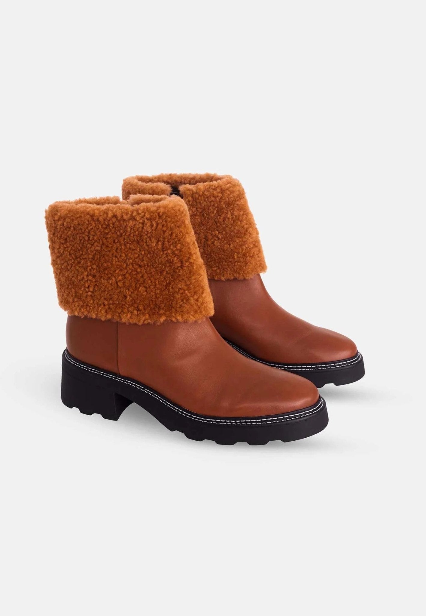 Brown Leather Ankle Boots Andira – Women’s Block Heel Boots with Decorative Shearling and Lug Sole - Organic LifestyleBrown Leather Ankle Boots Andira – Women’s Block Heel Boots with Decorative Shearling and Lug SoleBrown Leather Ankle Boots Andira – Women’s Block Heel Boots with Decorative Shearling and Lug SoleMangará AtelierOrganic Lifestyle480IN1VCO3838